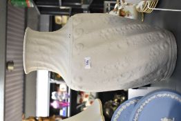 A large late 20th-century pottery vase, of baluster form with a decorative surface, illegible mark