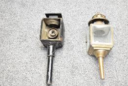 Two late 19th to early 20th-century brass and metal carriage lamps, featuring a bevelled glass