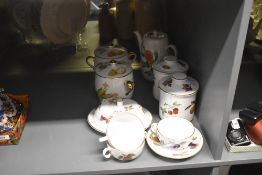 A Royal Worcester bone china 'Evesham' pattern dinner/tea service including four lidded storage