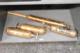 A large early 20th-century S.Maw.Son & Sons of London Parex brass grease gun/oiler; sold with two