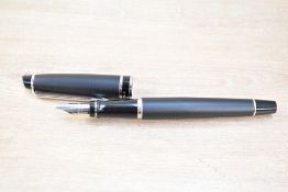 A Waterman Expert cartridge fill fountain pen in Matte Black having Waterman France M nib