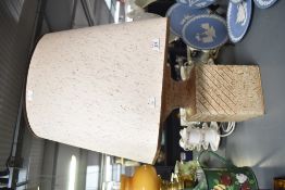 A mid to late 20th-century travertine-style table lamp, featuring a box-shaped base with diagonal