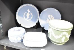 A small selection of 20th-century Wedgwood Jasperware in classic blue and sage green, featuring a