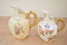 A pair of small Victorian Royal Worcester porcelain blush ivory jugs, of bulbous form with gilded