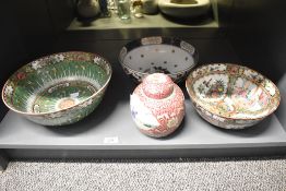 Three 20th-century Chinese ceramic decorative bowls, each decorated differently with repetitive