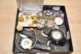 A selection of costume jewellery, including wristwatches, cufflinks and amethyst tumble stone
