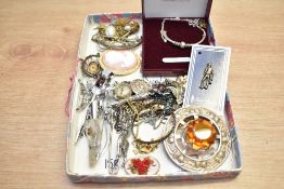 An assortment of costume jewellery, including a large white metal Scottish motif paste set brooch,