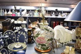 A late 20th-century floral ceramic lamp base, of baluster form, featuring a hand-painted peony-style