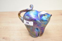 A 20th-century John Ditchfield Glasform iridescent cat paperweight, marked to base, approximately