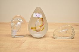 Three 20th-century studio art glass paperweights, to include a Svaja frosted glass egg-shaped