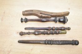 A selection of 19th to 20th century turned wooden spindle knitting sheafs, each of slender