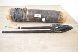 Thought to be 20th-century Chinese hand-carved dark wood hair stick, featuring a slender, zoomorphic