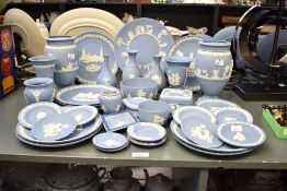 A large selection of 20th-century Wedgwood blue jasperware pottery, to include decorative plates,
