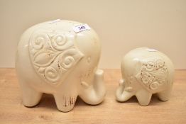 Two contemporary ceramic decorative elephants, having a soft cream-coloured glaze, (2), condition is