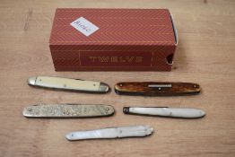 A selection of five late 19th to early 20th-century pocket knives, to include a tang-stamped Wraggs,