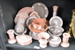 A quantity of 20th-century Wedgwood pink, violet and terracotta jasperware, to include decorative
