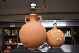 Two contemporary ceramic table lamp bases, to include a large spherical terracotta amphora-style