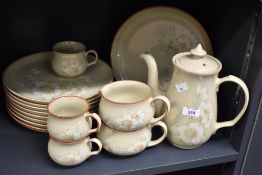 A quantity of late 20th-century Denby stoneware 'Day Break' tableware, featuring a charming design