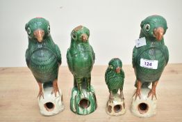 A quantity of 19th to early 20th-century Chinese sancai-glazed earthenware parrot figurines,