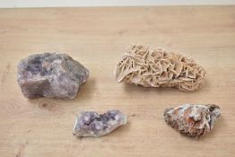 A collection of four assorted minerals, unknown age, including amethyst clusters and a desert rose