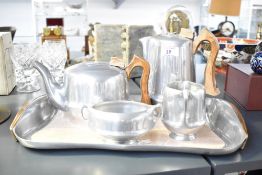 A set of mid 20th-century magnailium Picquot Ware tea and coffee set, featuring a sleek and stylised