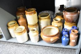 A large quantity of 19th/20th-century salt-glazed stoneware flagons, jars and pots, mostly featuring