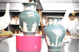 A pair of 20th-century Dudson Brothers of Stoke-on-Trent Jasperware teal vases, of baluster form,