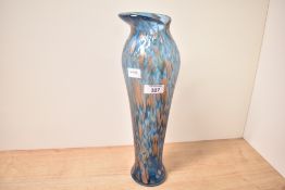 A tall 20th-century French studio art glass vase, of a slender, elongated form, having teal blue and