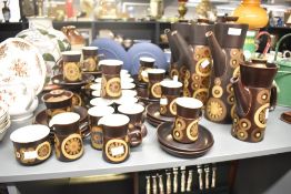 A large quantity of mid to late 20th-century Denby stoneware 'Arabesque' tea and coffee service,