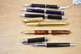 Six ballpoint and roller ball pens including Mulberry, Cross, Tierry Mugler