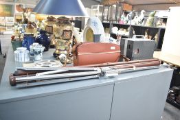 A Bolex K1 8mm Cine camera in leather case with Eumig Mark M projector and Screen