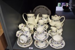 A 20th-century Paragon fine bone china 'Cherwell' tea and coffee service, featuring a delicate