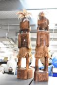 Two thought to be 20th-century Western Africa Tribal Art softwood male and female ancestral figures,