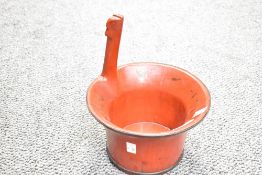 A 20th-century Chinese red lacquered elm wood water bucket, joined together by metal bands,