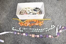 An assortment of costume jewellery, including faux pearls, beaded jewellery and statement pieces