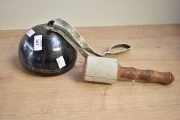 A late 20th-century Chinese handmade brass Yunnan Tea Horse bell, featuring traditional caravan bell