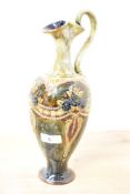An Art Nouveau Royal Doulton stoneware ewer vase, by E. Violet Hayward (1897-1942), featuring a