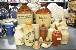 A quantity of 19th to early 20th-century salt-glazed stoneware flagons and bottles, to include two