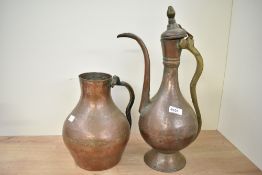 A late 19th to early 20th-century Middle Eastern-style copper ewer, 47cm; sold with a French-style