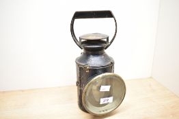 A late 19th to early 20th-century British Railways (Midland Region) metal hand lamp, having a