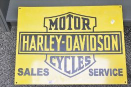 A contemporary reproduction Harley-Davidson Motor Cycles metal and enamel 'Sales & Service' sign,