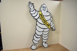 A large contemporary reproduction metal and enamel Michelin Man sign, 78cm, condition is