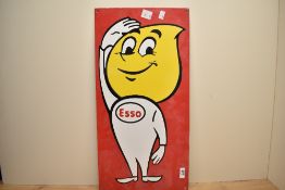 A late 20th-century Esso metal vintage-style 'Mr Drip' advertising sign, approximately 61cm tall,
