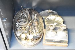 A selection of silver-plated ware to include a vintage shell shaped serving dish having scalloped