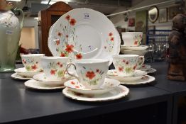 A quantity of 20th-century Colclough bone china 'Carmina' part tea set, featuring delicate red poppy