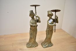 Two mid 20th-century Indian brass Japanes-style geisha girl figurines with parasols, unmarked,