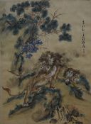 20th Century Chinese silk depicting two lions under a tree canopy, text and signature upper right,