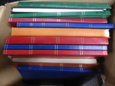 WORLDWIDE BOX OF COLLECTIONS, STOCKCARDS, PACKETS, LEAVES ALBUMS ETC Box with various worldwide