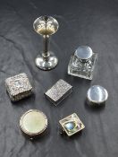 A Victorian silver snuff box, of hinged square form having embossed scroll decoration, marks for