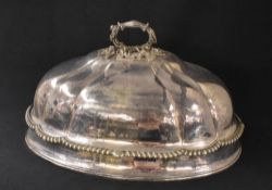 An impressive 19th/20th century silver plated meat dome, of traditional form having an oak motif